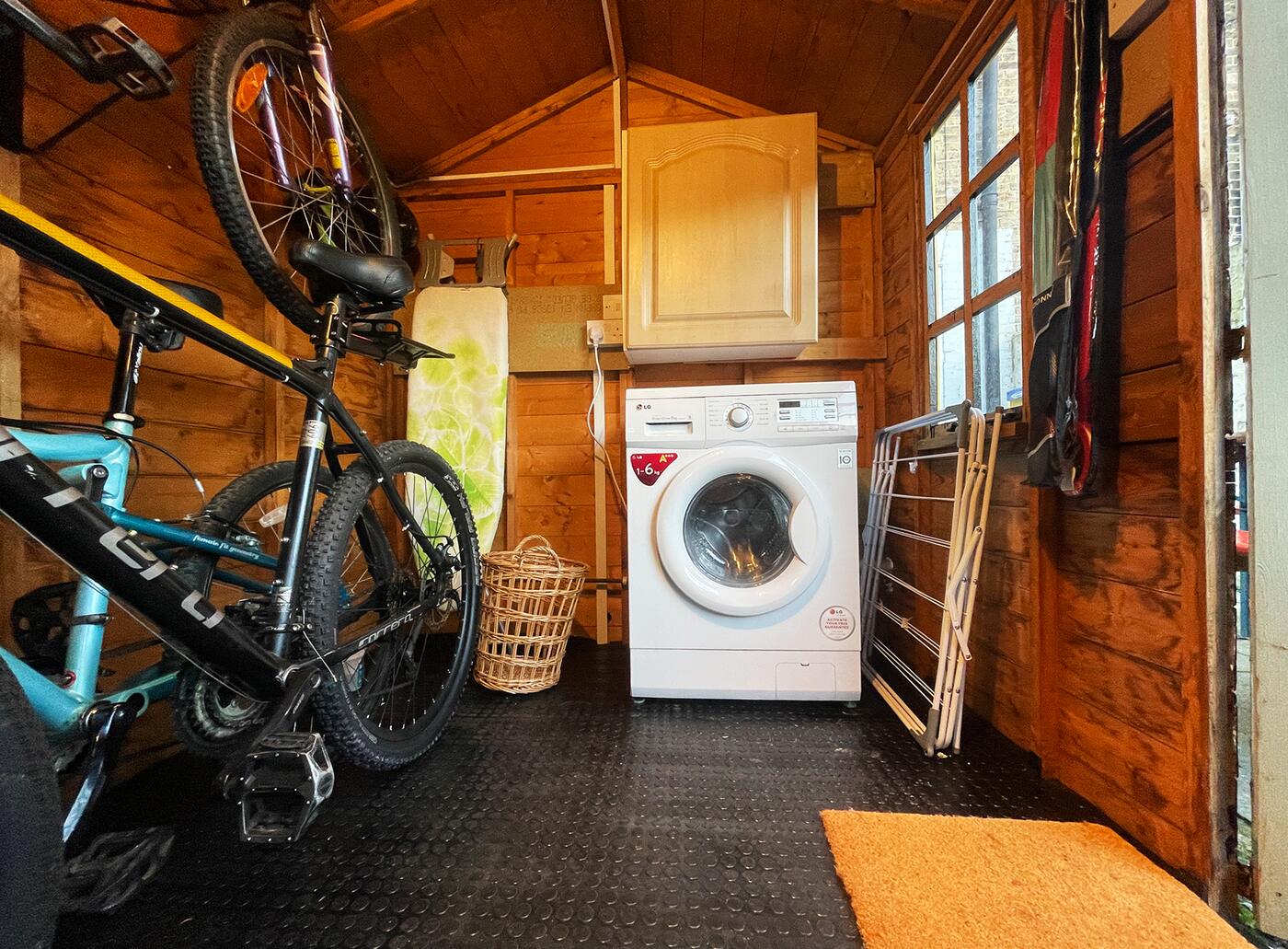 Washing machine and drying rack in the garden shed