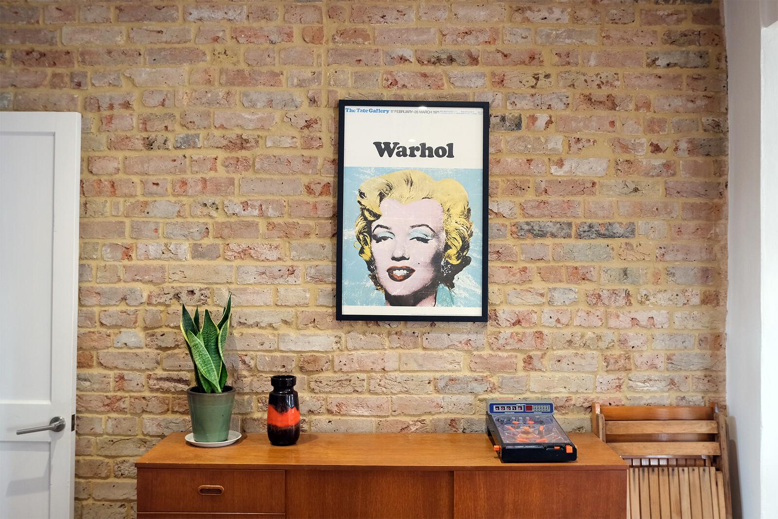Sideboard against exposed brick